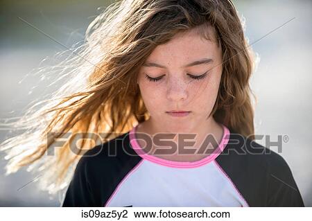Portrait of young girl, sad expression View Large Photo Image Stock Image - Portrait of young girl, sad expression. Fotosearch