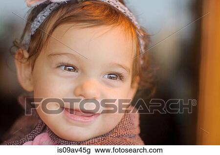 Portrait of young girl, smiling View Large Photo Image Stock Image - Portrait of young girl, smiling. Fotosearch