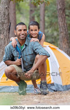 Portrait of young man and girl camping in forest, Sedona, Arizona, USA View Large Photo Image Stock Image - Portrait of young man and girl camping in forest, Sedona, Arizona, USA. Fotosearch