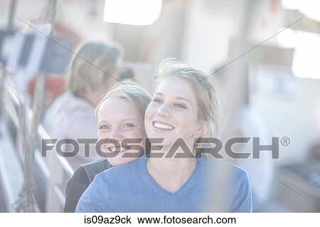 Portrait of young woman and girl on boat trip, Cape Town, South Africa View Large Photo Image Stock Image - Portrait of young woman and girl on boat trip, Cape Town, South Africa. Fotosearch