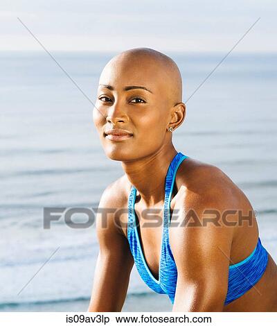 Portrait of young woman at beach View Large Photo Image Stock Photography - Portrait of young woman at beach. Fotosearch