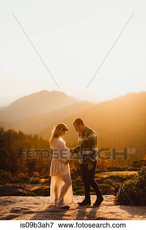 Pregnant couple in mountains, Sequoia national park, California, USA View Large Photo Image Stock Photo - Pregnant couple in mountains, Sequoia national park, California, USA. Fotosearch