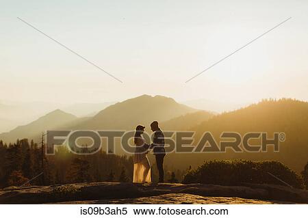 Pregnant couple in mountains, Sequoia national park, California, USA View Large Photo Image Stock Photography - Pregnant couple in mountains, Sequoia national park, California, USA. Fotosearch