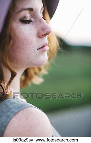 Profile of woman with eyes closed View Large Photo Image Stock Photo - Profile of woman with eyes closed. Fotosearch