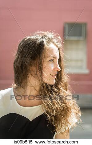 Profile portrait of woman looking away View Large Photo Image Stock Photography - Profile portrait of woman looking away. Fotosearch