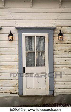 Stock Photo - Quaint front door and building exterior. Fotosearch