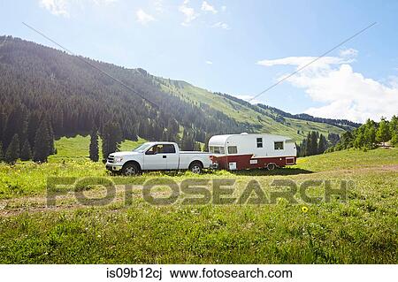 Recreational vehicle and caravan parked in landscape, Crested Butte, Colorado, USA View Large Photo Image Stock Image - Recreational vehicle and caravan parked in landscape, Crested Butte, Colorado, USA. Fotosearch