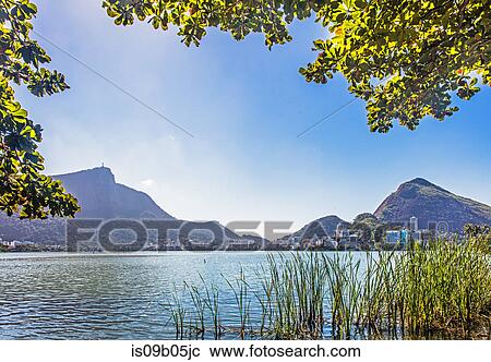 Rodrigo de Freitas Lagoon, Corcovado Ipanema, Christ the Redeemer in the distance, Rio de Janeiro, Brazil View Large Photo Image Stock Image - Rodrigo de Freitas Lagoon, Corcovado Ipanema, Christ the Redeemer in the distance, Rio de Janeiro, Brazil. Fotosearch
