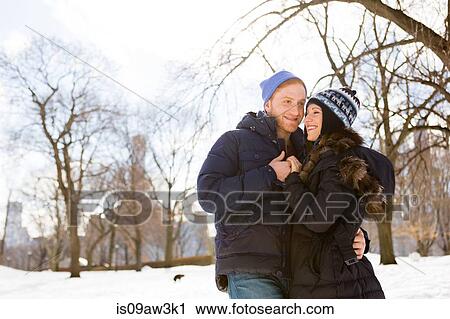 Romantic young couple in snowy Central Park, New York, USA View Large Photo Image Stock Image - Romantic young couple in snowy Central Park, New York, USA. Fotosearch