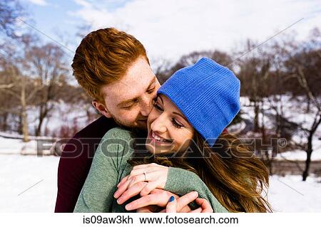 Romantic young couple in snowy Central Park, New York, USA View Large Photo Image Stock Image - Romantic young couple in snowy Central Park, New York, USA. Fotosearch