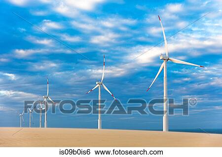 Row of wind turbines at coast, Taiba, Ceara, Brazil View Large Photo Image Stock Photograph - Row of wind turbines at coast, Taiba, Ceara, Brazil. Fotosearch