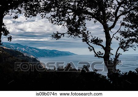 Silhouetted view of coastline and sea at dusk, Big Sur, California, USA View Large Photo Image Picture - Silhouetted view of coastline and sea at dusk, Big Sur, California, USA. Fotosearch