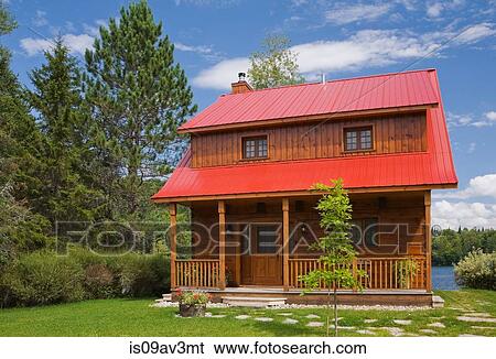 Small cottage style log home facade with red sheet metal roof and brown trim in summer View Large Photo Image Stock Photograph - Small cottage style log home facade with red sheet metal roof and brown trim in summer. Fotosearch