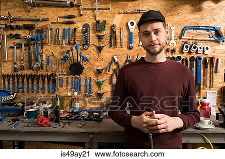 Technician in bicycle workshop View Large Photo Image Stock Image - Technician in bicycle workshop. Fotosearch