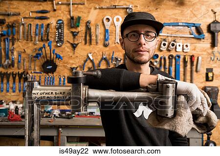 Technician in bicycle workshop View Large Photo Image Stock Image - Technician in bicycle workshop. Fotosearch