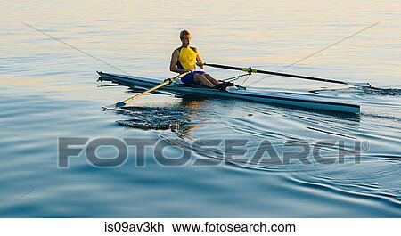 Teenage boy, sculling View Large Photo Image Stock Image - Teenage boy, sculling. Fotosearch