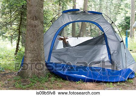 Teenage boy's hands poking out of tent, Washington, USA View Large Photo Image Stock Photo - Teenage boy's hands poking out of tent, Washington, USA. Fotosearch