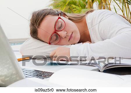 Teenage girl asleep on text books View Large Photo Image Stock Image - Teenage girl asleep on text books. Fotosearch