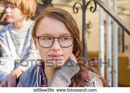Teenage girl, looking away, close-up View Large Photo Image Stock Photo - Teenage girl, looking away, close-up. Fotosearch