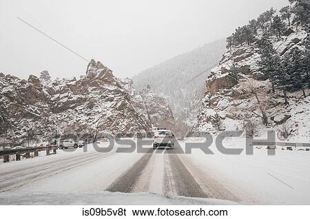 Truck on snow covered road, Denver, Colorado, USA View Large Photo Image Stock Photograph - Truck on snow covered road, Denver, Colorado, USA. Fotosearch