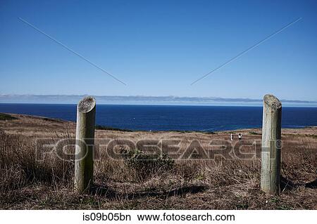 Picture - Two fence posts at coast, California, USA. Fotosearch