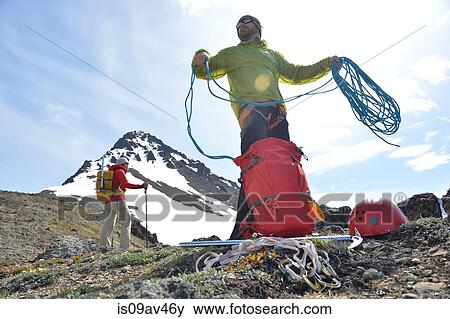 Two mountain climbers on mountain, Chugach State Park, Anchorage, Alaska, USA View Large Photo Image Stock Photo - Two mountain climbers on mountain, Chugach State Park, Anchorage, Alaska, USA. Fotosearch