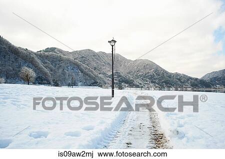 Tyre tracks in snow covered landscape, Lake Kawaguchiko, Mount Fuji, Japan View Large Photo Image Stock Image - Tyre tracks in snow covered landscape, Lake Kawaguchiko, Mount Fuji, Japan. Fotosearch