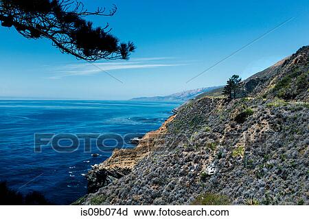 View of cliff and blue sea, Big Sur, California, USA View Large Photo Image Stock Image - View of cliff and blue sea, Big Sur, California, USA. Fotosearch