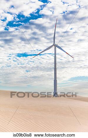 Wind turbine in desert dunes, Taiba, Ceara, Brazil View Large Photo Image Stock Photo - Wind turbine in desert dunes, Taiba, Ceara, Brazil. Fotosearch