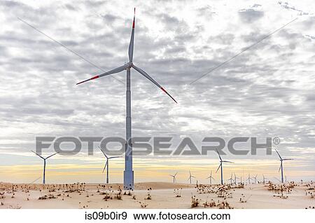 Wind turbines in desert landscape, Taiba, Ceara, Brazil View Large Photo Image Stock Photo - Wind turbines in desert landscape, Taiba, Ceara, Brazil. Fotosearch
