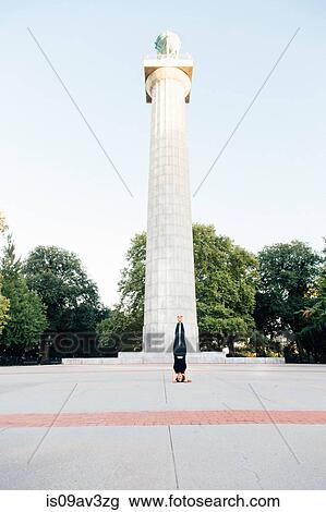 Woman doing headstand (Salamba Sirsasana), Prison Ship Martyrs' Monument, Fort Greene Park, New York, USA View Large Photo Image Stock Image - Woman doing headstand (Salamba Sirsasana), Prison Ship Martyrs' Monument, Fort Greene Park, New York, USA. Fotosearch