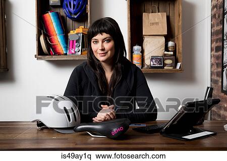 Woman in cycling accessories shop View Large Photo Image Stock Photography - Woman in cycling accessories shop. Fotosearch