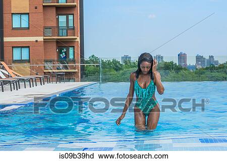 Woman in swimming pool View Large Photo Image Stock Image - Woman in swimming pool. Fotosearch