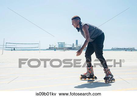Woman on rollerblades View Large Photo Image Stock Photo - Woman on rollerblades. Fotosearch