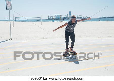 Woman on rollerblades View Large Photo Image Stock Photograph - Woman on rollerblades. Fotosearch