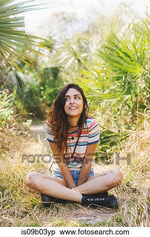 Woman sitting among trees, Bonita Springs, Florida View Large Photo Image Stock Photography - Woman sitting among trees, Bonita Springs, Florida. Fotosearch