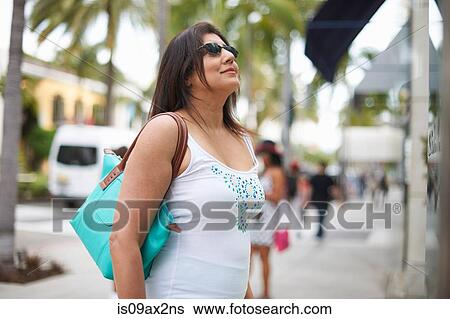 Woman window shopping, Los Angeles, California, USA View Large Photo Image Stock Photograph - Woman window shopping, Los Angeles, California, USA. Fotosearch