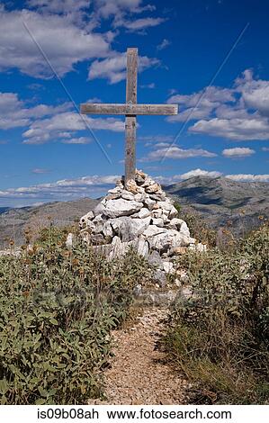Wooden cross on pile of rocks, Dubrovnik, Dalmatia region, Croatia, Eastern Europe View Large Photo Image Stock Image - Wooden cross on pile of rocks, Dubrovnik, Dalmatia region, Croatia, Eastern Europe. Fotosearch