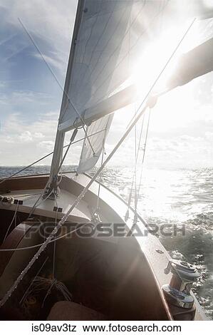 Yacht on ocean in sunlight View Large Photo Image Stock Photo - Yacht on ocean in sunlight. Fotosearch