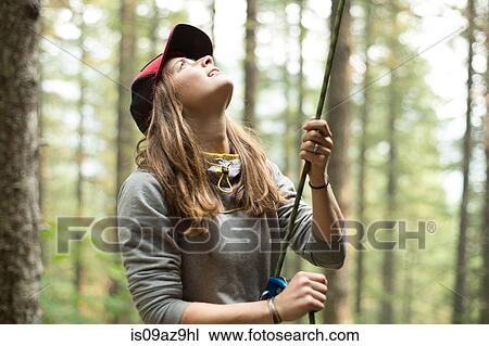 Young female climber holding climbing rope in forest, Mount Hood National Forest, Oregon, USA View Large Photo Image Stock Image - Young female climber holding climbing rope in forest, Mount Hood National Forest, Oregon, USA. Fotosearch