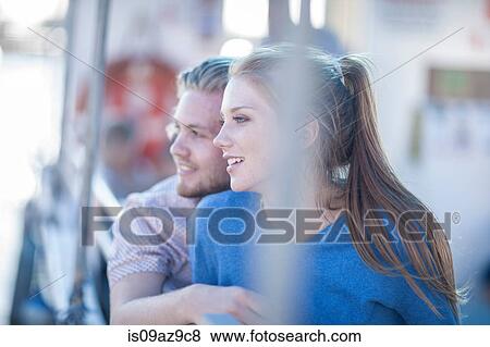 Young tourist couple looking out on boat trip, Cape Town, South Africa View Large Photo Image Stock Photo - Young tourist couple looking out on boat trip, Cape Town, South Africa. Fotosearch