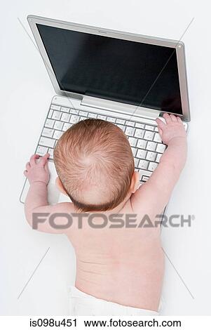 Baby with a laptop View Large Photo Image Stock Image - Baby with a laptop. Fotosearch