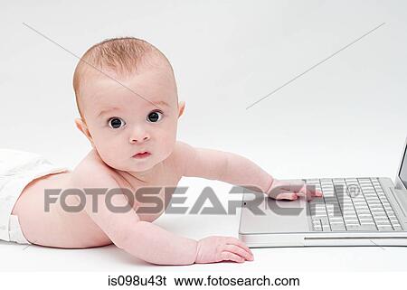 Baby with a laptop View Large Photo Image Stock Photograph - Baby with a laptop. Fotosearch