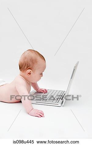 Baby with a laptop View Large Photo Image Stock Photography - Baby with a laptop. Fotosearch