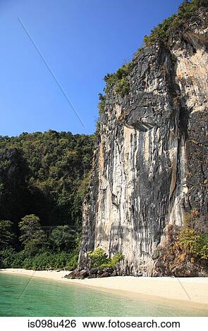 Beach and limestone outcrop, hong island, thailand View Large Photo Image Stock Photograph - Beach and limestone outcrop, hong island, thailand. Fotosearch