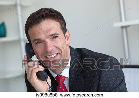 Stock Photo - Businessman on phone. Fotosearch