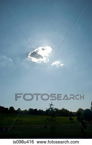 Cloud in front of sun View Large Photo Image Stock Photograph - Cloud in front of sun. Fotosearch