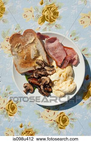 English breakfast on chintz tablecloth View Large Photo Image Stock Image - English breakfast on chintz tablecloth. Fotosearch
