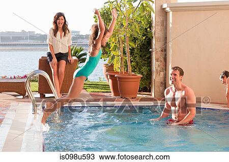 Family at the pool View Large Photo Image Stock Image - Family at the pool. Fotosearch