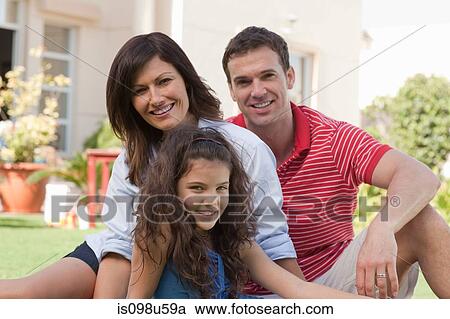 Stock Image - Family in the garden. Fotosearch